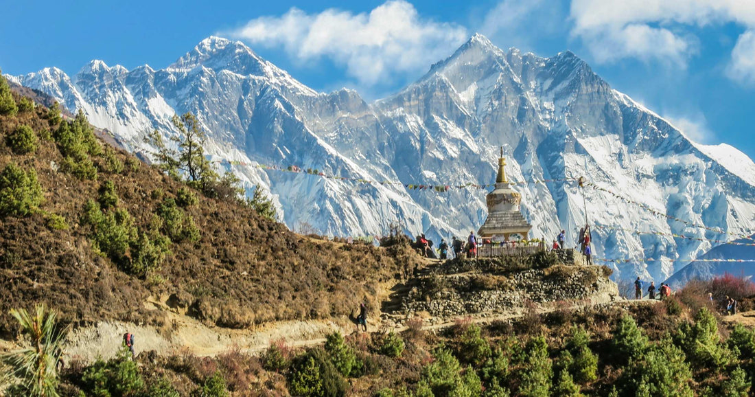 Buddhist stupa on the Namche trail with Everest and Lhotse behind — Nepal trekking