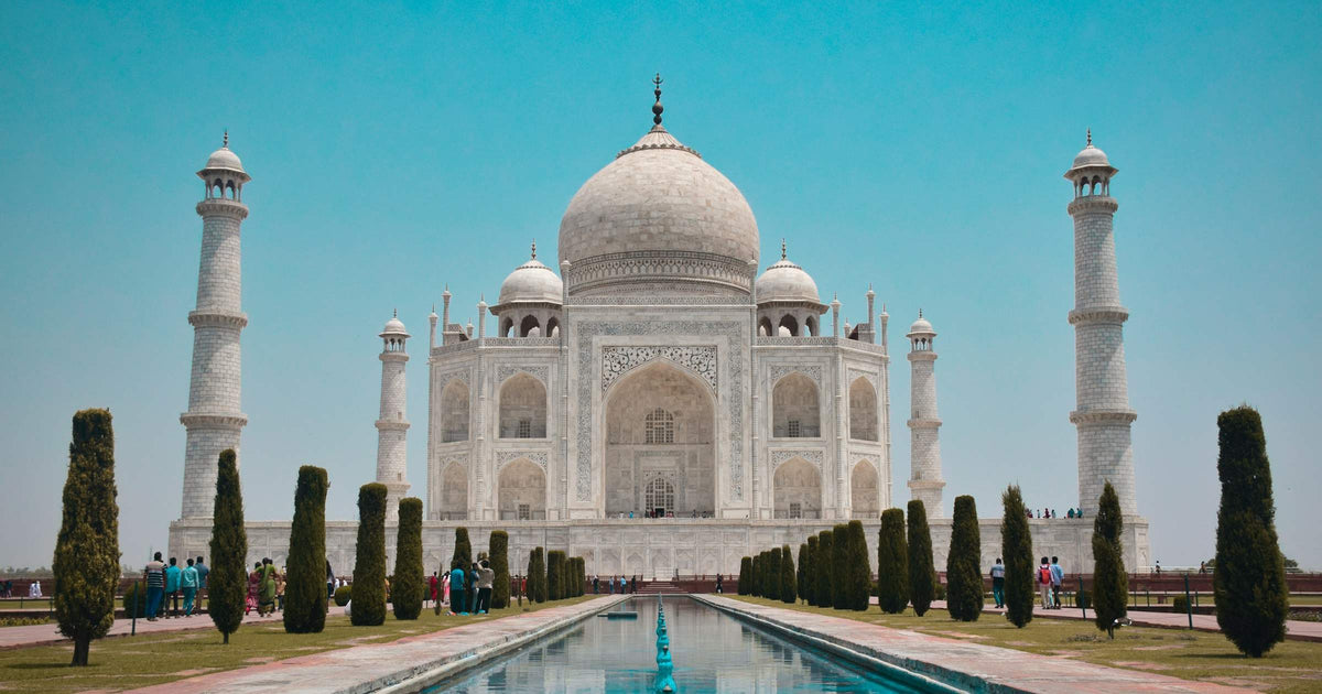 Taj Mahal in Agra, India, reflected in the central pool — the iconic Golden Triangle landmark