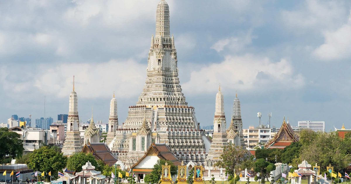 Wat Arun temple on the Chao Phraya river in Bangkok, Thailand