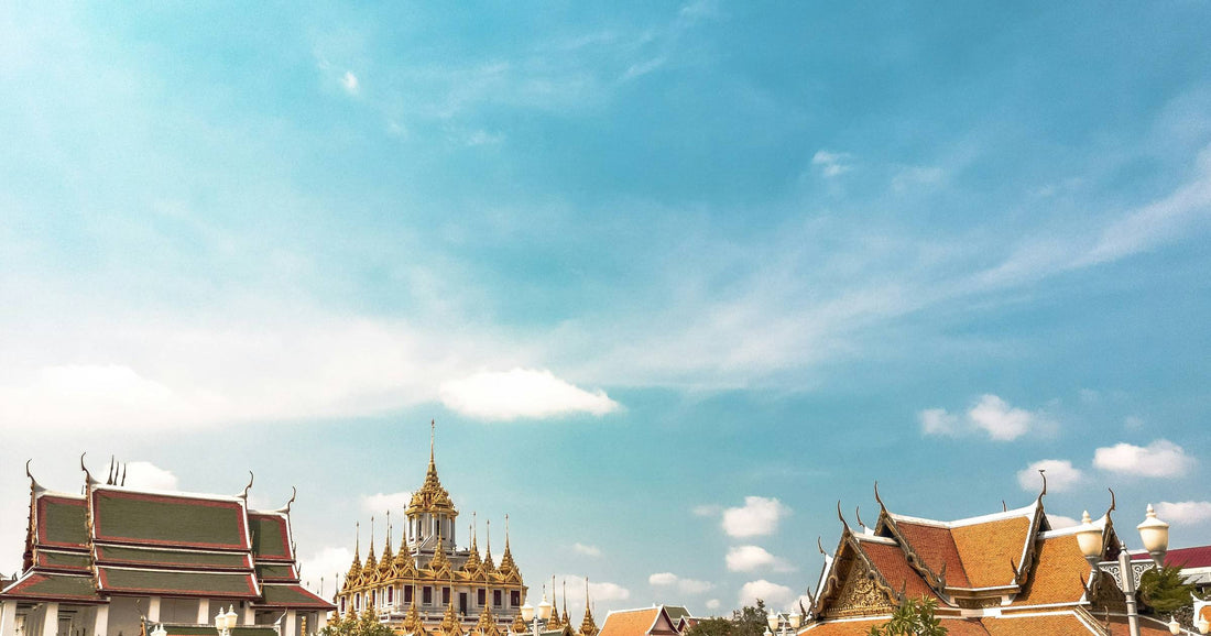 Bangkok temple complex with golden spire, Thailand